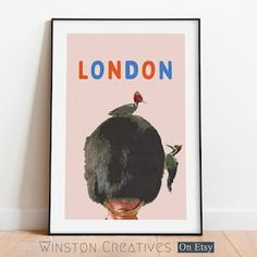 a poster with the words london on it and two birds perched on top of each other