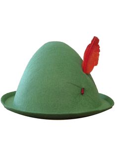 a green hat with a red feather on it