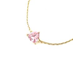 High quality gold chain bracelet with a beautiful pink rose triangle shaped stone. This sparkly cubic zirconia stone will make an excellent addition to your arm candy. Gold cable chain link bracelet is made of 925 silver and 24k gold plating. The bracelet is hypoallergenic, waterproof and can be worn daily. This bracelet would be a beautiful addition to your arm candy or worn on it's own. DETAILS:Length: Adjustable from 6.5 inches to 7 inchesMaterial: 925 silver in 24k gold plating Pink Dainty Bracelet With Adjustable Chain, Dainty Pink Bracelets With Adjustable Chain, Dainty Pink Bracelet With Adjustable Chain, Pink Gold Plated Bracelet, Elegant Pink Heart Bracelet As Gift, Pink Gold-plated Bracelet, Dainty Pink Bracelets For Anniversary, Pink Delicate Chain Jewelry As Gift For Her, Elegant Pink Heart Bracelet For Party