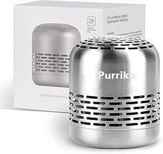 the purko portable bluetooth speaker is in front of a box with its lid open