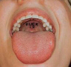 a woman's tongue with the word fluff written on it and her mouth open