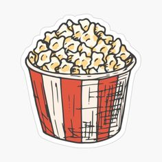 a red and white bucket filled with popcorn sticker on top of a white surface