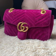 Gucci Marmont Velvet Shoulder Bag In Color Rubin This Bag Is Stunning The Color Is Beyond Beautiful Hardware Does A Great Job At Contrasting It And Elevating The Luxurious Feel. (No Dust Bag No Box) Comes With Care Instructions And Sale Tag. But I Don’t Have A Receipt. This Is An Authentic Bag And I Have Taken The Necessary Picture Markers Where You Can Check For Authenticity. Pictures Show Signs Of Wear Mainly Where The Chain Falls. A Pen Stain Is Inside The Zipper Compartment Inside The Bag. Along With Some Use Inside The Bag But Minimal. Bag Is Being Stored In A Generic Dust Bag And It Is Stuff To Maintain Shape. As Well As Chain Being Wrapped In Bubble Wrap To Minimize Contact With Gucci Marmont Velvet, Sale Tag, Pen Stain, Authentic Bags, Gucci Marmont, A Pen, Great Job, Velvet Material, Gucci Bags