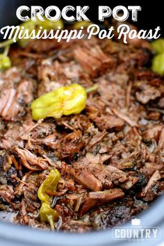 shredded meat and vegetables in a bowl with the words slow cooker pulled pork on it