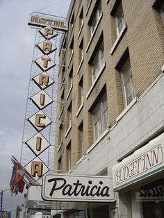 a sign that is on the side of a building