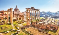 an aerial view of the roman forum and its surrounding buildings in rome, italy on a sunny day