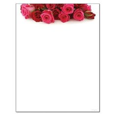 pink roses are on top of a white sheet of paper