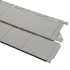 two different types of metal roofing on top of each other, one in grey and the other in white