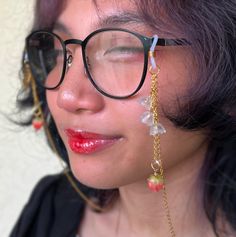 "Adorable glasses chain with the cutest resin strawberry charms, acrylic flowers, and a gold tone leave to match the chain! The silicone loops on this jewelry allow it to easily slip on your glasses, adding a unique touch to any outfit in seconds.  Also available as a half-chain/charm! See it here: https://www.etsy.com/listing/1246423340/ Approximate chain length is 26\" Approximate dangle length is 2\"" Curly Hair Dos, Flower Glasses, Chains Aesthetic, Eyewear Chain, Eyeglass Strap, Strawberry Flower, Strawberry Charm, Glasses Strap, Glasses Chains