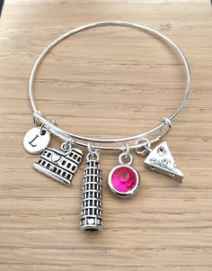 Italy Bracelet, Italy gifts , Italy jewelry, Italy Keyring, Gift for Italian, Italian gifts, Cheese, Rome, Colosseum, Tower of Pisa, Roman Different colors available please send me a personal message for more information. For Similar products :  https://www.etsy.com/uk/shop/YouLoveYouShop?ref=hdr_shop_menu&section_id=16711668 For Extra initials or customization please message me directly I am happy to help.  Photo might be Slightly Different From Actual Item in Terms of Color Due to camera flash Italy Gifts, Italy Bracelet, Rome Colosseum, Italian Gifts, Italy Jewelry, Italy Gift, Tower Of Pisa, Camera Flash, Silver Plated Jewelry