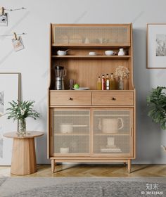 a wooden cabinet with wicker doors and drawers in a living room next to a potted plant