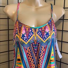 Aztec Print Swim Dress. New With Tags Can Be Worn Over Cutoffs Has Removal Brest Pads Crisscross Back Adjustable Straps,Side Slits As Seen In Photos. Open To Offers One-piece Beachwear Top For Poolside, Summer One-piece Top For The Beach, Multicolor Halter Neck Tankini For Summer, Tropical Style Sleeveless Tankini For Vacation, Stretchy Beach Top, One-piece Beachwear Tops For Vacation, Summer Multicolor Halter Neck Tankini, Beachwear One-piece Tops For Vacation, Multicolor Triangle Top Beachwear