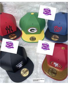 several hats with different colors and logos on them