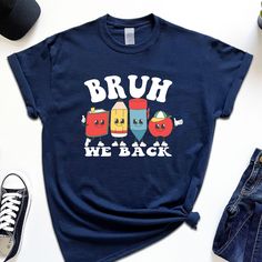 Get ready for the school season with our "Bruh We Back Shirt." This cute and trendy back-to-school shirt is perfect for students and teachers alike, adding a fun twist to your school wardrobe. Show your school spirit and embrace the new academic year in style! How to Order,  -All scroll pictures -Select the Size and Color of the Product from the drop-down menus - Select Quantity - Add your table and place your order - You need to repeat each step for each shirt Our main priority here is customer satisfaction. Our products are high quality and super soft, comfortable custom shirts. We use new technology DTF printers and transfer the desings on the shirts with a professional grade heat press. Thank you for supporting small businesses Production Time: - 1-2 days Shipping Time: - Standard ship School Spirit T-shirt For College And Back To School, Back To School Spirit T-shirt For College, Casual Teacher Appreciation T-shirt For Back To School, College Style Graphic T-shirt For School, Collegiate Graphic Print Tops For School, Graphic Print College Style Tops For School, College Style Graphic Print Tops For School, Casual Graphic Print Tops For School, Back To School Spirit Shirt For College