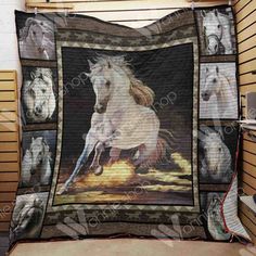 a quilt with horses on it in a room