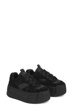 A skater-inspired sneaker set on a bodaciously chunky platform features a mixed-media upper done in varying shades of black for easy pairing. Exclusive retailer 2 3/4" platform Lace-up style Leather upper and lining/synthetic sole Imported Nakedwolfe Sneakers, Sneakers With Platform, Black Sneakers Women, Black Platform Sneakers, Ateez Concert, Chunky Platform Sneakers, Concert Ideas, Naked Wolfe, Black Platform