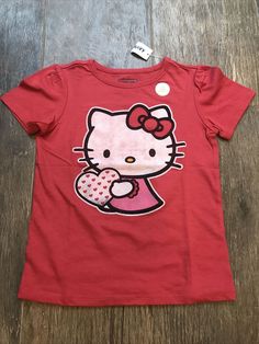 Hello Kitty Heart Valentine Red T shirt Size 3T Girls NEW Old Navy Collectibilities “Burnout Graphics”, please take note that the graphics are not even colored and appears as burnout or washed out effect, this is how it is and not an imperfection There is also glitter on the heart graphic Condition is "New with tags" Red Hello Kitty Cotton T-shirt, Red Cotton Hello Kitty T-shirt, Red Cotton T-shirt With Hello Kitty Print, Red Hello Kitty Short Sleeve Tops, Hello Kitty Heart, Sanrio Clothes, Hello Kitty T Shirt, Hello Kitty Y2k, 2000s Japanese Fashion