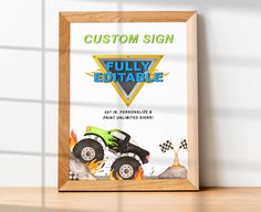 a wooden frame with a monster truck on it and the words fully edible printed below