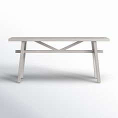 a white wooden table with two crossed legs on an isolated background, in the shape of a cross