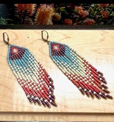 Lovely Sedona southwestern style fringe earrings make the perfect accessory to your favorite outfit. Muted rich colors of the Red Rocks in Sedona AZ are the inspiration for these earrings. They are lightweight, fluid & measure 2 inches in length. Bohemian Teardrop Fringe Jewelry, Multicolor Long Drop Fringe Earrings, Southwestern Fringe Earrings For Festivals, Southwestern Tassel Earrings For Festivals, Southwestern Fringe Dangle Earrings, Southwestern Fringe Dangle Jewelry, Southwestern Red Beaded Dangling Earrings, Southwestern Red Beaded Earrings With Dangling Beads, Southwestern Multicolor Fringe Earrings