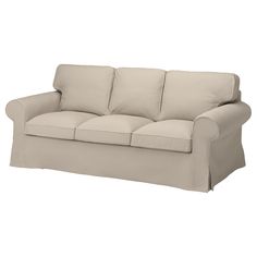 a white couch with two pillows on it