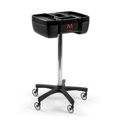 a black table with wheels on it and a red m logo on the back side