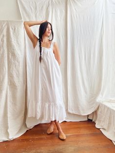 The nightgown that made us fall in love with the whole range, the Jodie features feminine broderie anglaise embrodiered straps and a generously shirred neckline with a button down front and flounced ruffle hem. We love this style on it’s own for day and night or worn unbuttoned and layered. Sewing Pattern Nightgown, Diy Nightgown, Prairie Nightgown, Pretty Nightgowns, Doen Style, Gown Aesthetic, Garment Inspiration, Cute Nightgowns, Night Gown Dress