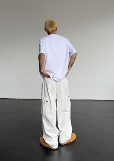 Model is 5ft 9''(176cm) tall, 145 lbs(66kg) weight and wearing a size L168cm 59kg wearing a size M - Tooling cargo- Adjustable waist- Side pockets- Straight fit- 5 colors Urban White Cotton Bottoms, White Full-length Cargo Jeans With Pockets, Urban Style White Cotton Bottoms, Urban White Pants For Streetwear, White Relaxed Fit Full-length Cargo Jeans, Baggy White Straight Leg Pants, White Urban Style Pants For Streetwear, Urban White Streetwear Pants, White Cargo Pocket Trousers