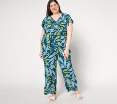 From shopping to sightseeing to sampling the local cuisine, this charming jumpsuit in deliciously drapey viscose accommodates all your favorite vacation (or staycation) pursuits. From AnyBody® Lounge and Sleepwear. Tropical V-neck Jumpsuits And Rompers For Vacation, Casual Rayon Jumpsuits And Rompers For Spring, Casual Rayon Jumpsuits And Rompers For Vacation, Summer Beach Rayon Jumpsuits And Rompers, Summer Beach Jumpsuits And Rompers In Rayon, Casual Beach Vacation Jumpsuits And Rompers, Summer Jumpsuits And Rompers For Vacation, Casual Jumpsuits And Rompers For Beach Vacation, Summer Jumpsuits And Rompers For Vacation Day Out