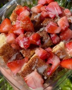 a close up of a plate of food with strawberries