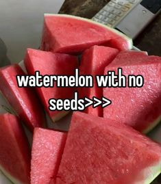 watermelon with no seeds on a plate next to a remote control and the caption reads, watermelon with no seeds