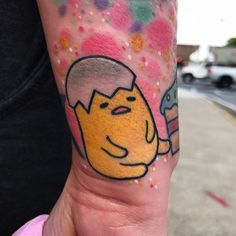 a person with a tattoo on their arm