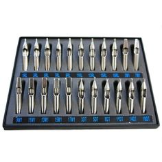 an assortment of drill bits in a tray