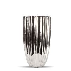 a black and white vase sitting on top of a table