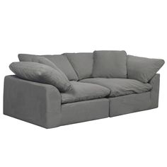 a grey couch with pillows on it and the words house selement - parade non inc