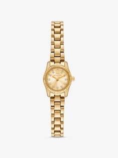 The Lexington watch epitomizes everyday glamour with its golden hue and sparkling pavé accents. Made entirely of stainless steel, this mini timepiece boasts a round face with a beveled topring and a matching bracelet strap. Slip it on to give both day and night outfits a dose of sophisticated charm. Michael Kors Gold Diamond Watch With Metal Dial, Michael Kors Gold Diamond Watch With Round Dial, Michael Kors Gold Diamond Watch For Formal Occasions, Michael Kors Gold Watches For Formal Occasions, Michael Kors Gold Watch With Metal Dial, Michael Kors Gold Watches With Diamond Hour Markers, Gold Michael Kors Watches With Diamond Hour Markers, Round Face, Matching Bracelets