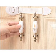 The doors and drawers of furniture in modern homes are easy to open and close. When children are playing, they may accidentally catch their hands and cause injuries. After using these safety locks, it is easy for adults to open, but not easy for children to open, which can effectively prevent children from being injured. Parameters: Material :pp+ABS Size :21*5cm/8.27*1.97inch Color: white Packing: 10 PCS/bag 100% high quality and new Applies to: refrigerators, cabinets, windows, bookcases, doors, Toilet lid,etc. Instructions: After installing the safety lock, if you want to open the refrigerator door or drawer, find the arrow mark on the larger end of the white plastic block, press the arrow firmly and pull out the insert. Note: 1.Please allow 1-3mm error due to manual measurement and make