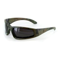 "Camo Spex" sports goggles from Aloha Eyewear are for men and women who need ultimate UV protection when enjoying the great outdoors. These wrap-around lenses protect your eyes from harmful sunlight at any angle while the inner padded lining shield you from hazards like foliage, insects, and flying debris. Better yet, the lenses are fully polarized, practically eliminating glare from reflective surfaces such as water, snow, glass, and metal. Camo Spex goggles are the perfect accompaniment for fi Anti-reflective Shield Sunglasses For Outdoor Use, Anti-reflective Polycarbonate Shield Sunglasses For Outdoor, Outdoor Anti-reflective Shield Sunglasses In Polycarbonate, Outdoor Shield Sunglasses With Uv Protection, Anti-reflective Polycarbonate Sunglasses For Outdoor Activities, Protective Sunglasses With Uv Protection For Outdoor, Functional Polycarbonate Shield Sunglasses For Outdoor, Outdoor Shield Sunglasses With Uva Protection, Adjustable Shield Sunglasses With Uva Protection For Outdoor