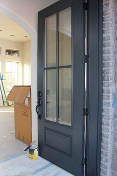 the front door is painted black and gray