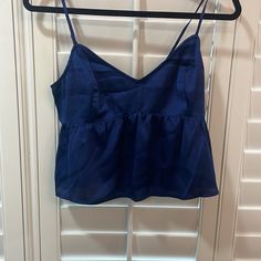 This Is A Gorgeous Holister Silk Babydoll Tank!!! Never Worn!! Nwt!! Adjustable Straps!! Has A V-Neck Fit! Size Mediums! Multiple Colors!! White, Pink, And Navy Blue! Blue Camisole For Summer Night Out, Chic Blue V-neck Camisole, Cute Camisole For Spring Party, Spring Blue Camisole For Night Out, Blue Spring Camisole For Night Out, Blue Camisole For Spring Night Out, Blue Camisole For Night Out In Spring, Blue V-neck Tank Top For Night Out, Blue Sleeveless Flirty Tops