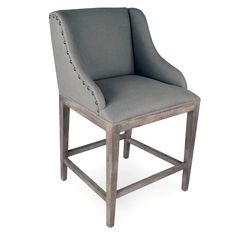 a gray upholstered chair with buttons on the armrests and back rest