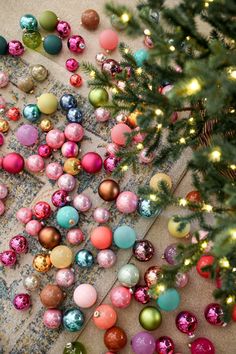 a christmas tree with ornaments and lights on it