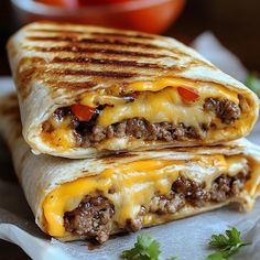 Delicious Grilled Cheeseburger Wraps: Quick & Easy Recipe! Beef Sandwich With Tortilla, Dinner With Tortilla Wraps, Dinner Ideas With Wraps, Burger Wrapped In Tortilla, Dinner Ideas Tortillas, Turkey Burger Wraps, Recipes For Tortillas Wraps, Cheeseburger Wraps Healthy, Best Wraps For Dinner