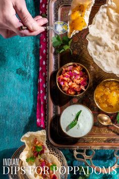 Various dips for poppadoms in snall bowls on a gold tray, surrounded by poppadoms. Indian Dips, Homemade Dips