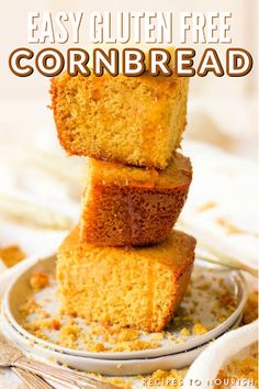 Photo of 3 large slices of thick cornbread, stacked on top of each other with a thick slice of butter on the top and honey drizzled over them, sitting on top of a plate with cornbread crumbs and a kitchen towel sitting around it with text that says Easy Gluten Free Cornbread. Cornbread Recipe Without Milk, Easy Cornbread Recipe, Healthy Cakes, Skillet Cornbread