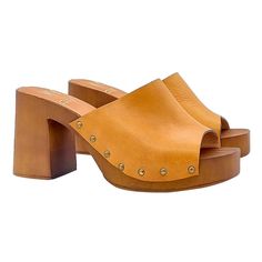 "If you prefer comfort and love casual, our clogs will adapt perfectly to your outfit. Clogs with brown \"effect\" wood base Upper in tan leather Comfortable and regular insole Wide and comfortable 8.5 cm heel and 3 cm plateau Entirely made by specialized Italian personnel Handcrafted using the best materials BEFORE COMPLETING YOUR PURCHASE DO NOT FORGET TO CHECK THE SIZE!" Suede Clogs, Women's Clogs, Leather Clogs, Red Suede, Womens Clogs, Perfect Shoes, Tan Leather, Stiletto Heels, Clogs