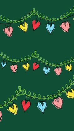 a bunch of hearts are hanging on a line with green leaves and string lights in the background