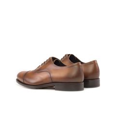 Characterized by its closed lacing style, the oxford is an elegant, classic, timeless style suitable for any occasion. The oxford is a staple shoe in any man’s wardrobe and can be dressed up or down. The Details: *burnished Materials: cognac box calf Sole: brown goodyear leather sole + buttons rubber injections Last: Zurigo - Rounded toe for fraditional English Look What is Fast Lane? Fast lane is our new experimental 7 day made to order collection, an ambitious never been heard of before collec Men's Oxford Shoes, Brown City, Staple Shoes, Custom Made Shoes, Oxford Shoes Men, Goodyear Welt, Shoes Leather, Mens Oxfords, Black Laces