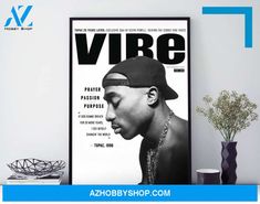 a black and white photo of a man wearing a hat on the cover of vibe magazine