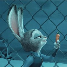 an animated rabbit holding a carrot behind a chain link fence